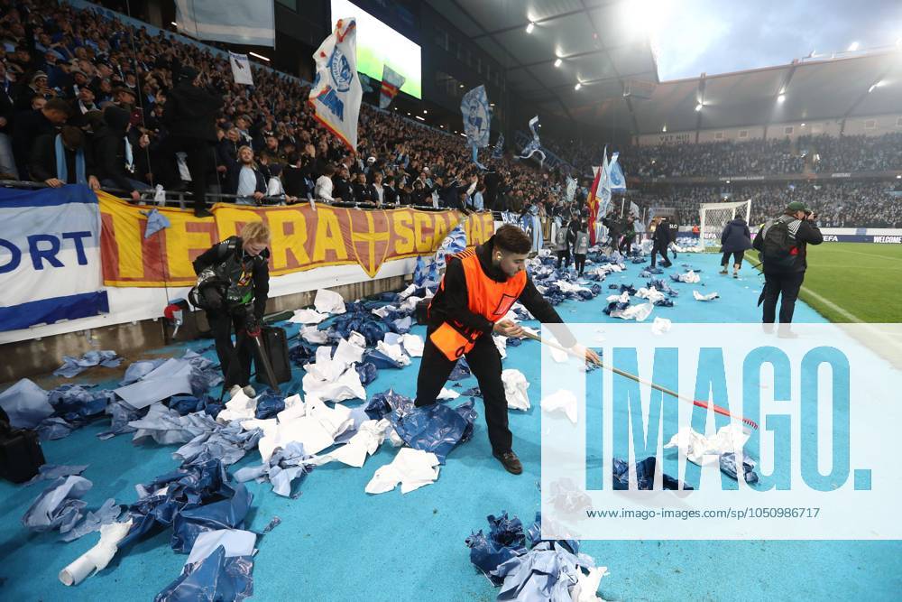 KW39 A steward seen raking paper and foil signs in the opening minutes of the match Malmo v Rangers, UEFA Europa League, Group Stage, Football, Eleda Stadion, Malmo, Sweden, 26 Sep 2024