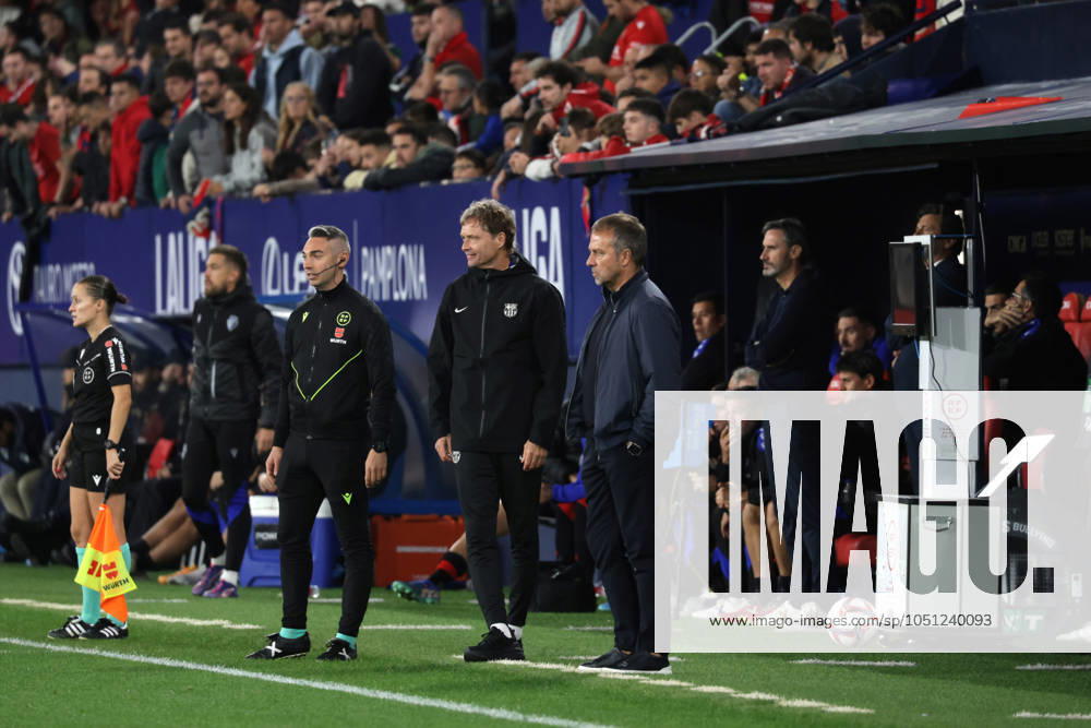 Spain - LaLiga EA Sports - CA Osasuna vs FC Barcelona, Barca - 28 09 2024 SPAIN, PAMPLONA, SEPTEMBER 28. Hansi Flick Head Coach of FC Barcelona and Marcus Sorg Assistant Coach of FC Barcelona (R to L) during LaLiga EA Sports football match between CA Osasuna and FC Barcelona at Estadio El Sadar on September 28, 2024 in Pamplona, Spain. Photo by Manuel Blondeau AOP.Press Pamplona El Sadar Stadium Navarra Spain