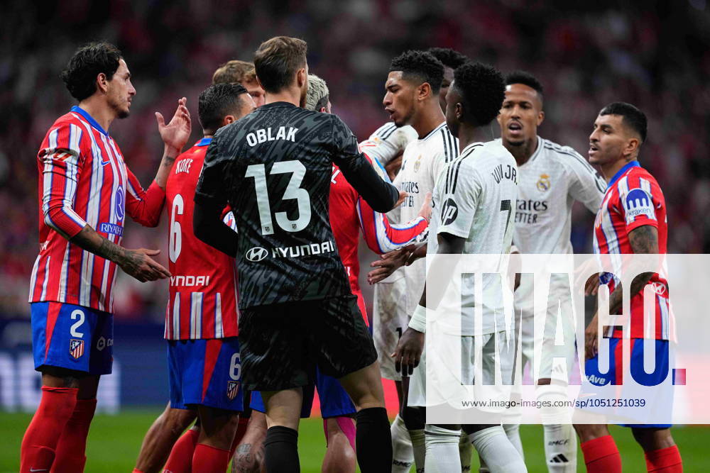 Jude Bellingham of Real Madrid fights with Jorge Resurreccion Koke of Atletico de Madrid during the Spanish League, LaLiga EA Sports, football match played between Atletico de Madrid and Real Madrid at Civitas Metropolitano stadium on September 29, 2024, in Madrid, Spain. Madrid SPAIN - ZUMAa181 20240929_zaa_a181_432