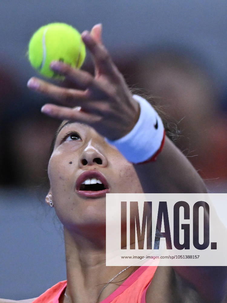 (241003) -- BEIJING, Oct. 3, 2024 -- Zheng Qinwen serves during the women s singles round of 16 match between Amanda Anisimova of the United States and Zheng Qinwen of China at the 2024 China Open tennis tournament in Beijing, China, Oct. 2, 2024. ) (SP)CHINA-BEIJING-TENNIS-CHINA OPEN-WOMEN S SINGLES(CN) ZhangxLong