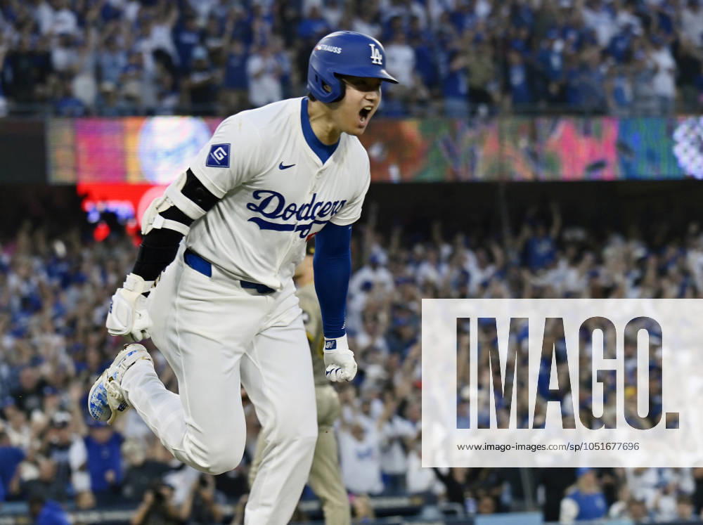 Los Angeles Dodgers designated hitter Shohei Ohtani reacts after hitting a three-run home run against the San Diego Padres in the second inning in game one of the MLB, Baseball Herren, USA NLDS at Dodger Stadium in Los Angeles on Saturday, October 5, 2024. LAP2024100540 JIMxRUYMEN