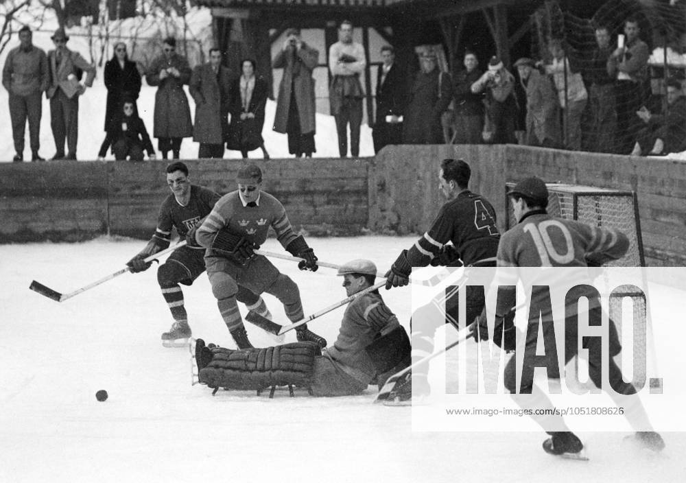 SWITZERLAND SAINT MORITZ 1948 02 03 Sweden s goalie Kurre Svanberg has taken a sitting position while the USA goes on the attack during an ice hockey match which the USA won 5 2 at the 1948 Winter Olympics Sankt Moritz Switzerland OS sp sw