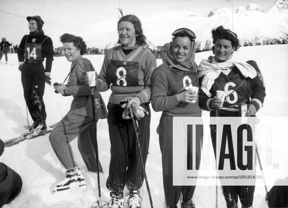 SWITZERLAND SAINT MORITZ 1948 02 Orig caption AFTER THE WOMEN DOWNHILL RACE The women s downhill race was won by the Swiss Eddy Schlunegger Our picture shows right to left Eddy Schlunegger, Celina Seghi Italy and May Nilsson Sweden Note Slalom Downhill CD355 persons MAY NILSSON CELINA SEGHI EDDY SCHLUNEGGER sites ITALY SWEDER SWITZERLAND SAINT MORITZ SANKT MORITZ SWITZERLAND OS sp sw