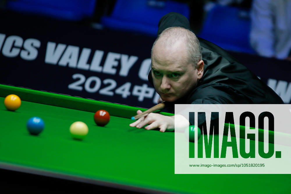 Graeme Dott of Scotland plays a shot in the second round match against Zhang Anda of China on day 2 of 2024 Wuhan Open (Snooker) at China Optics Valley Convention & Exhibition Centre on October 7, 2024 in Wuhan, Hubei Province of China.