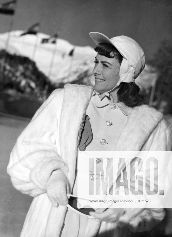 SWITZERLAND SAINT MORITZ 1948 02 05 Paulette Goddard, American film actress, is seen among the spectators at the Olympic Stadium during the men s free skating at the 1948 Winter Olympics Here she admires compatriot Richard Button s perfect performance Sankt Moritz Switzerland OS sp sw