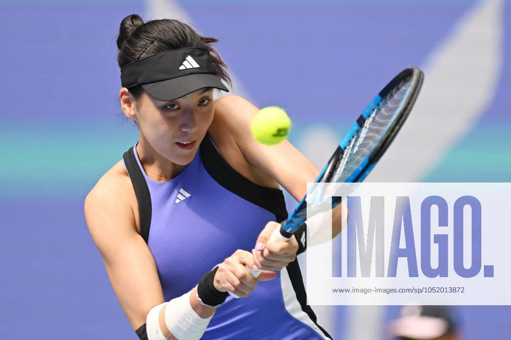 (241010) -- WUHAN, Oct. 10, 2024 -- Wang Xinyu hits a return during the women s singles round of 16 match between Wang Xinyu of China and Jessica Pegula of the United States at the 2024 Wuhan Open tennis tournament in Wuhan, capital of central China s Hubei Province, Oct. 10, 2024. ) (SP)CHINA-WUHAN-TENNIS-WUHAN OPEN-WOMEN S SINGLES(CN) ChengxMin