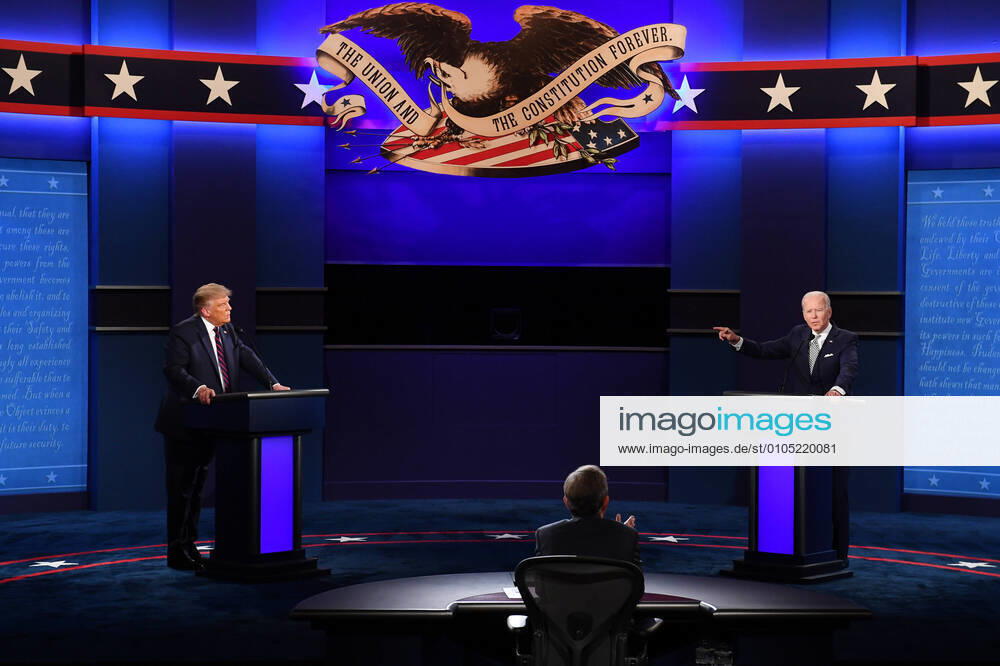 President Donald Trump (L) and Democratic presidential nominee Joe Biden (R), with Chris Wallace moderating, face off in the first of three scheduled 90 minute presidential debates, in Cleveland, Ohio, on Tuesday, September 29, 2020. CLE20200929580 KEVINxDIETSCH
