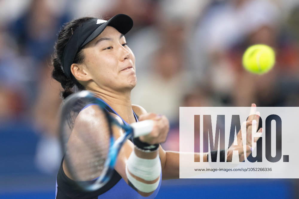 (241012) -- WUHAN, Oct. 12, 2024 -- Wang Xinyu hits a return during the women s singles semifinal match between Zheng Qinwen of China and Wang Xinyu of China at the 2024 Wuhan Open tennis tournament in Wuhan, central China s Hubei Province, Oct. 12, 2024. ) (SP)CHINA-WUHAN-TENNIS-WUHAN OPEN-WOMEN S SINGLES (CN) XiaoxYijiu