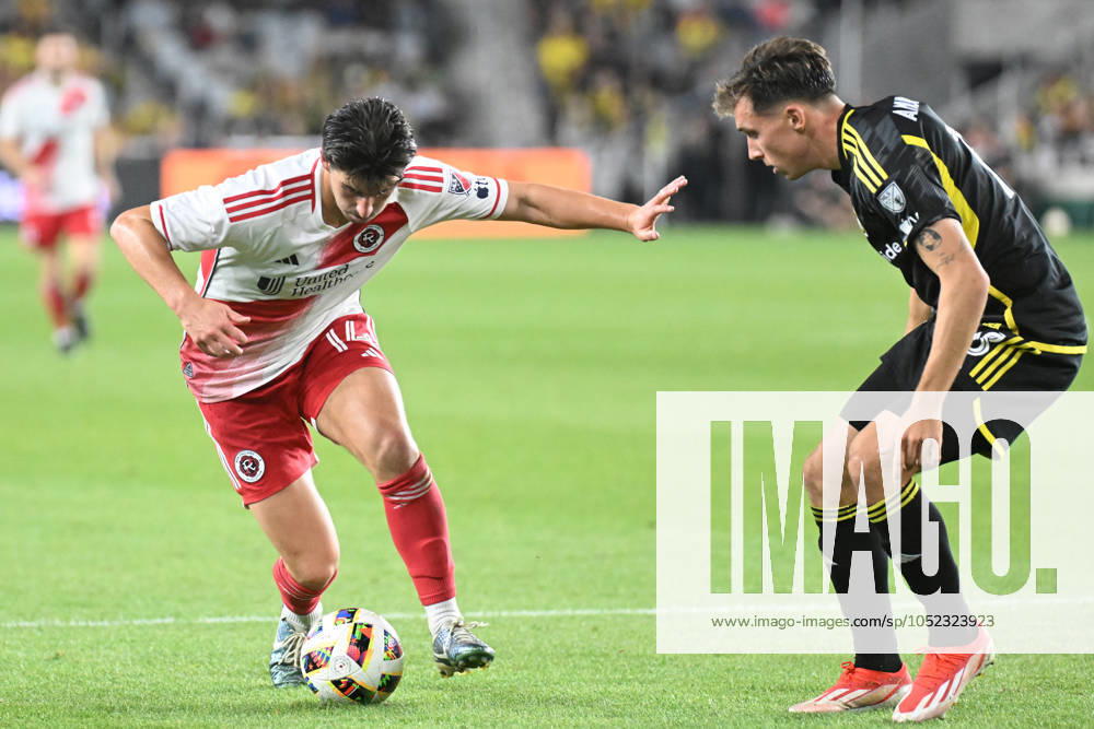 New England Revolution midfielder Ian Harkes (14) handles the ball against Columbus Crew defender Malte Amundsen (18) in their match in Columbus, Ohio. Cal Media Columbus USA - ZUMAc04_ 20241012_zma_c04_563