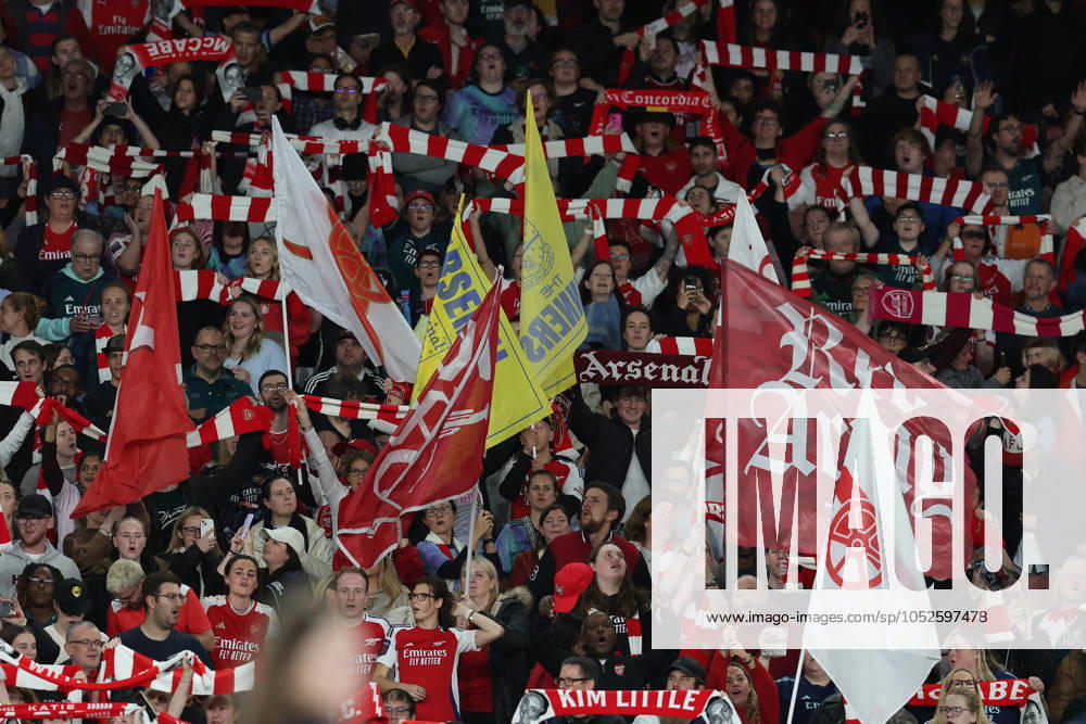 London, England, 16th October 2024. Arsenal fans wave flags during the UEFA Womens Champions League match at the Emirates Stadium, London. Picture credit should read: Paul Terry Sportimage . SPI-3383-0051