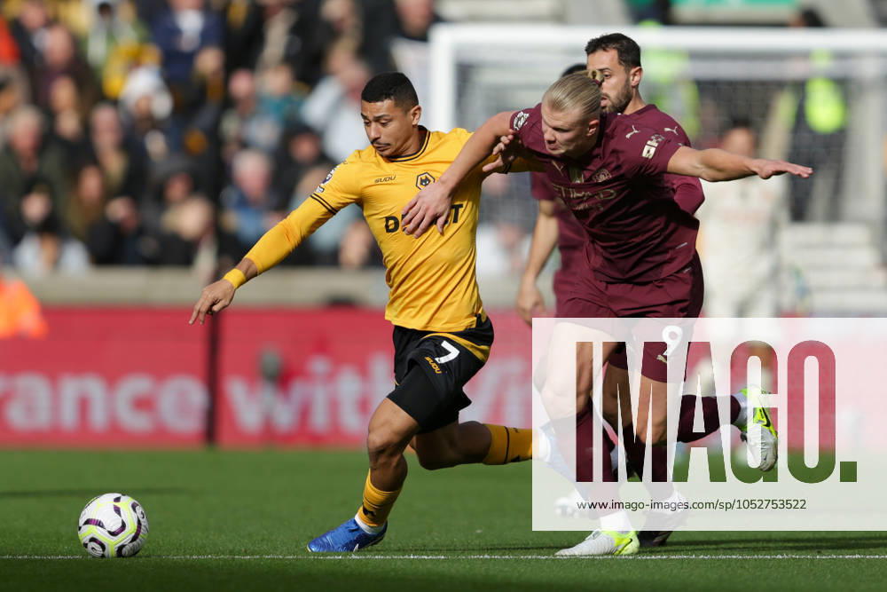 Wolverhampton Wanderers FC v Manchester City FC - Premier League Andre of Wolves battles for possession with Erling Haaland of Manchester City during the Premier League match between Wolverhampton Wanderers and Manchester City at Molineux in Wolverhampton, England, on October 20, 2024. Wolverhampton West Midlands United Kingdom