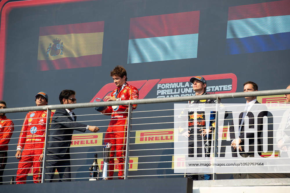 Charles Leclerc (16) with Scuderia Ferrari HP Team (center) claims victory at the Formula 1 Pirelli United States Grand Prix, Circuit of the Americas. Austin, Texas. CSM Austin United States of America - ZUMAc04_ 20241020_faf_c04_038