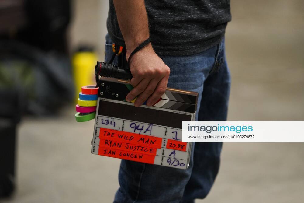 A member of the production crew holds the clapperboard before rehearsals, during production of the movie tentatively titled The Wild Man, featuring a Bigfoot-like creature called the Skunk Ape, at MOSI on Wednesday, Sept. 30, 2020 in Tampa. Tampa USA - ZUMAs70_ 20200930_zan_s70_171