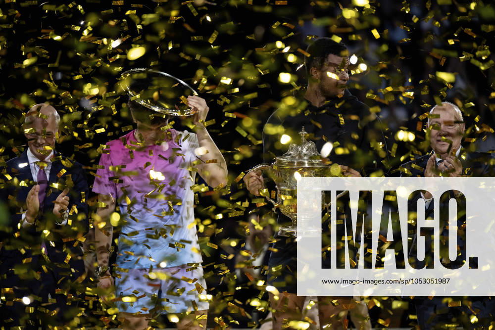KW43 27th October 2024; St. Jakobshalle, Basel, Switzerland; ATP, Tennis Herren 500 Swiss Indoors Basel Tennis, Day 7; Giovanni Mpetshi Perricard (FRA) and Ben Shelton (USA) duck from the confetti during the trophy ceremony after the final ActionPlus12709413 DavidxEmm
