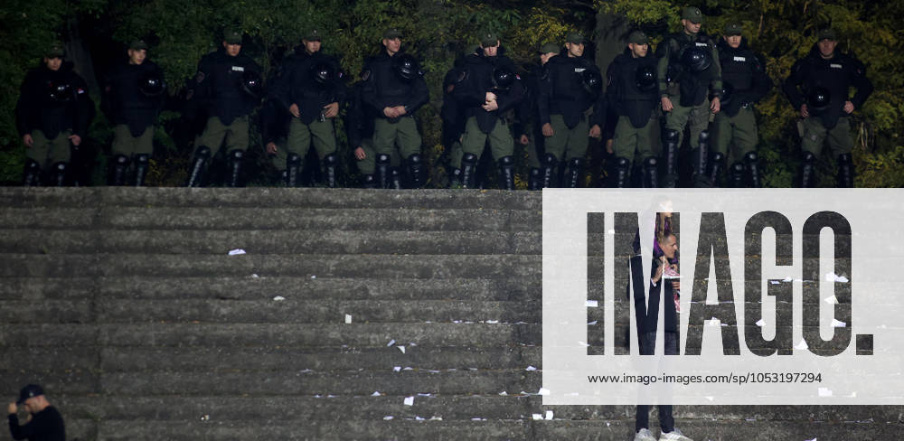 Subotica(Serbia) FK Spartak- FK Crvena Zvezda(Red Star) Super Liga men s football Riot police cordon above fan with child :