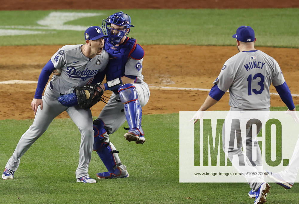 Los Angeles Dodgers closing pitcher Walker Buehler celebrates with catcher Will Smith after the Dodgers beat the New York Yankees 7-6 in game five to win the MLB, Baseball Herren, USA World Series at Yankee Stadium in New York City on Wednesday, October 30, 2024. The Dodgers won the best-of-seven series 4-1. NYP20241030351 JOHNxANGELILLO