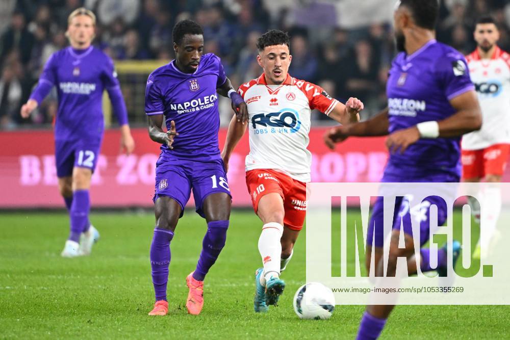 RSC Anderlecht v KV Kortrijk - Jupiler Pro League ANDERLECHT, BELGIUM - NOVEMBER 03 : Ashimeru Majeed midfielder of RSC Anderlecht, Kadri Abdelkahar midfielder of KV Kortrijk during the Jupiler Pro League match between RSC Anderlecht and KV Kortrijk on November 3, 2024 in Anderlecht, Belgium, 03 11 2024 Anderlecht Belgium
