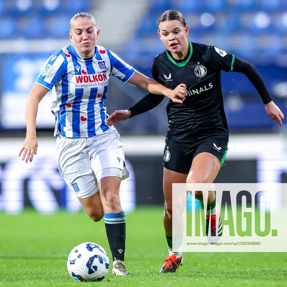 2024-11-02 sc Heerenveen v Feyenoord - Dutch Azerion Womens Eredivisie HEERENVEEN, NETHERLANDS - NOVEMBER 2: Demi Werther of sc Heerenveen battles for the ball with Justine Brandau of Feyenoord during the Dutch Azerion Womens Eredivisie match between sc Heerenveen and Feyenoord at Abe Lenstra Stadion on November 2, 2024 in Heerenveen, Netherlands. (Photo by Pieter van der Woude BSR Agency) Heerenveen Netherlands Content not available for redistribution in The Netherlands directly or indirectly through any third parties.