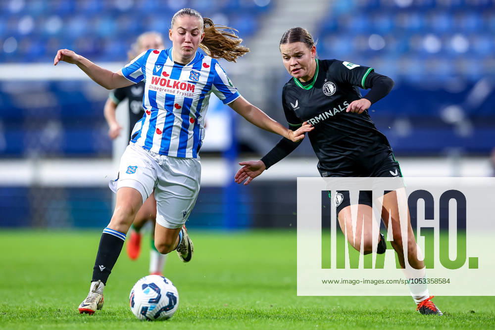2024-11-02 sc Heerenveen v Feyenoord - Dutch Azerion Womens Eredivisie HEERENVEEN, NETHERLANDS - NOVEMBER 2: Demi Werther of sc Heerenveen battles for the ball with Justine Brandau of Feyenoord during the Dutch Azerion Womens Eredivisie match between sc Heerenveen and Feyenoord at Abe Lenstra Stadion on November 2, 2024 in Heerenveen, Netherlands. (Photo by Pieter van der Woude BSR Agency) Heerenveen Netherlands Content not available for redistribution in The Netherlands directly or indirectly through any third parties.