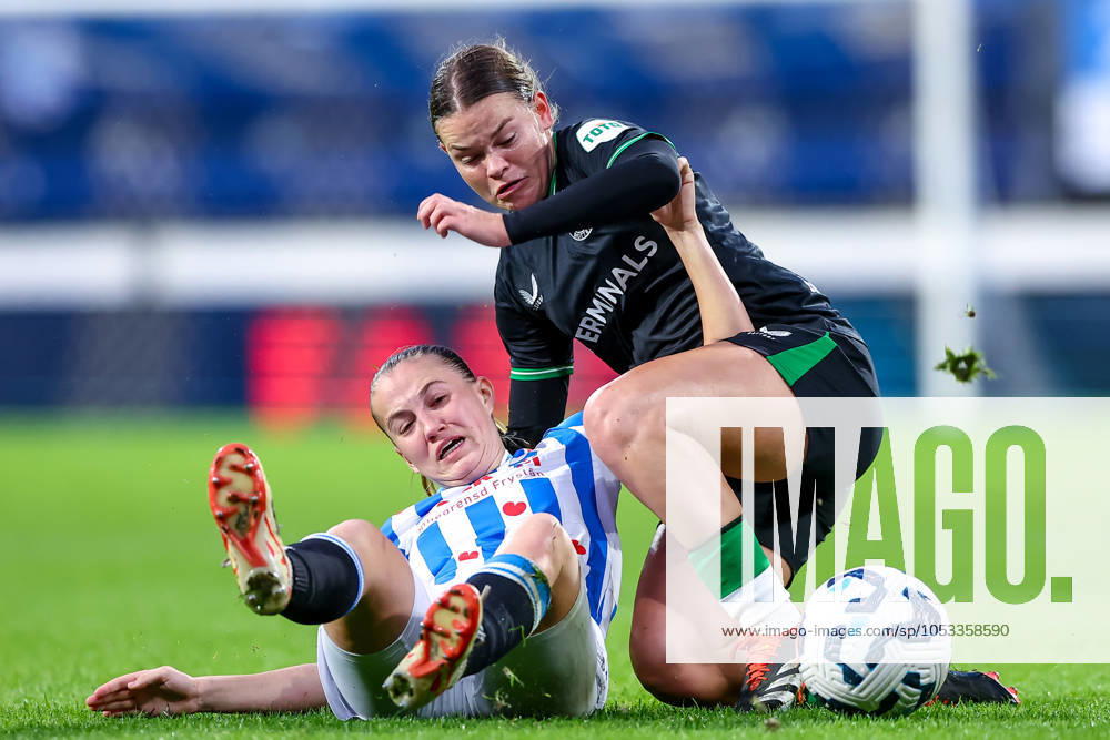 2024-11-02 sc Heerenveen v Feyenoord - Dutch Azerion Womens Eredivisie HEERENVEEN, NETHERLANDS - NOVEMBER 2: Demi Werther of sc Heerenveen battles for the ball with Justine Brandau of Feyenoord during the Dutch Azerion Womens Eredivisie match between sc Heerenveen and Feyenoord at Abe Lenstra Stadion on November 2, 2024 in Heerenveen, Netherlands. (Photo by Pieter van der Woude BSR Agency) Heerenveen Netherlands Content not available for redistribution in The Netherlands directly or indirectly through any third parties.