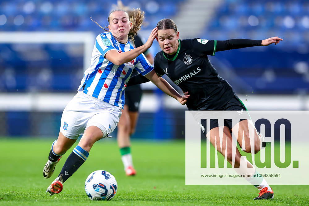 2024-11-02 sc Heerenveen v Feyenoord - Dutch Azerion Womens Eredivisie HEERENVEEN, NETHERLANDS - NOVEMBER 2: Demi Werther of sc Heerenveen battles for the ball with Justine Brandau of Feyenoord during the Dutch Azerion Womens Eredivisie match between sc Heerenveen and Feyenoord at Abe Lenstra Stadion on November 2, 2024 in Heerenveen, Netherlands. (Photo by Pieter van der Woude BSR Agency) Heerenveen Netherlands Content not available for redistribution in The Netherlands directly or indirectly through any third parties.