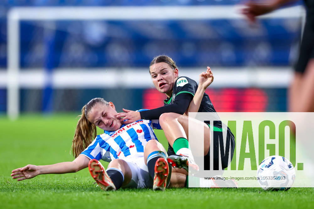2024-11-02 sc Heerenveen v Feyenoord - Dutch Azerion Womens Eredivisie HEERENVEEN, NETHERLANDS - NOVEMBER 2: Demi Werther of sc Heerenveen battles for the ball with Justine Brandau of Feyenoord during the Dutch Azerion Womens Eredivisie match between sc Heerenveen and Feyenoord at Abe Lenstra Stadion on November 2, 2024 in Heerenveen, Netherlands. (Photo by Pieter van der Woude BSR Agency) Heerenveen Netherlands Content not available for redistribution in The Netherlands directly or indirectly through any third parties.