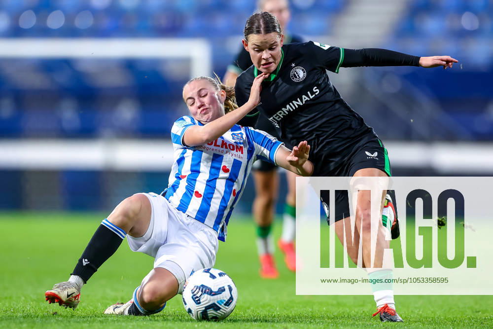 2024-11-02 sc Heerenveen v Feyenoord - Dutch Azerion Womens Eredivisie HEERENVEEN, NETHERLANDS - NOVEMBER 2: Demi Werther of sc Heerenveen battles for the ball with Justine Brandau of Feyenoord during the Dutch Azerion Womens Eredivisie match between sc Heerenveen and Feyenoord at Abe Lenstra Stadion on November 2, 2024 in Heerenveen, Netherlands. (Photo by Pieter van der Woude BSR Agency) Heerenveen Netherlands Content not available for redistribution in The Netherlands directly or indirectly through any third parties.