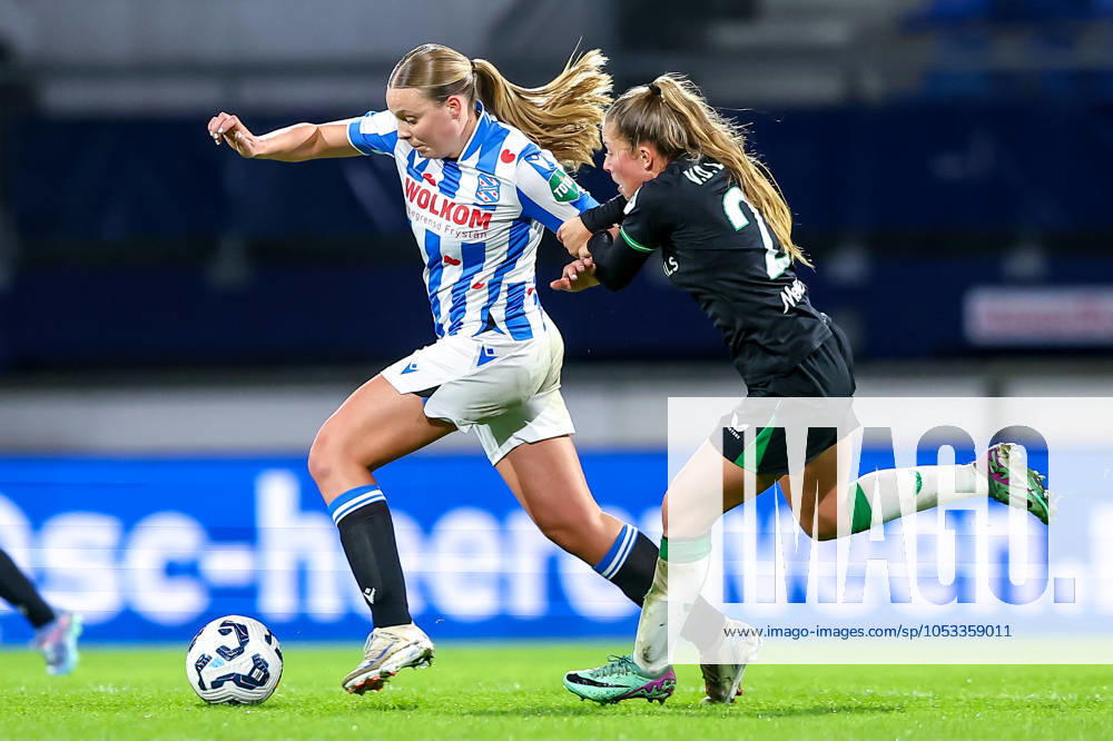 2024-11-02 sc Heerenveen v Feyenoord - Dutch Azerion Womens Eredivisie HEERENVEEN, NETHERLANDS - NOVEMBER 2: Eef Smits of sc Heerenveen is challenged by Romeà Van De Lavoir of Feyenoord during the Dutch Azerion Womens Eredivisie match between sc Heerenveen and Feyenoord at Abe Lenstra Stadion on November 2, 2024 in Heerenveen, Netherlands. (Photo by Pieter van der Woude BSR Agency) Heerenveen Netherlands Content not available for redistribution in The Netherlands directly or indirectly through any third parties.