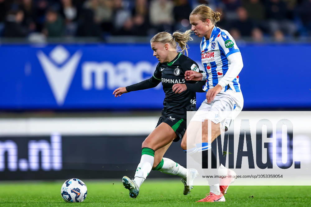 2024-11-02 sc Heerenveen v Feyenoord - Dutch Azerion Womens Eredivisie HEERENVEEN, NETHERLANDS - NOVEMBER 2: Noëlle Van Der Sluijs of Feyenoord battles for the ball with Evi Maatman of sc Heerenveen during the Dutch Azerion Womens Eredivisie match between sc Heerenveen and Feyenoord at Abe Lenstra Stadion on November 2, 2024 in Heerenveen, Netherlands. (Photo by Pieter van der Woude BSR Agency) Heerenveen Netherlands Content not available for redistribution in The Netherlands directly or indirectly through any third parties.