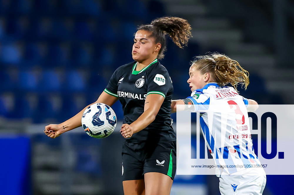 2024-11-02 sc Heerenveen v Feyenoord - Dutch Azerion Womens Eredivisie HEERENVEEN, NETHERLANDS - NOVEMBER 2: Jada Conijnenberg of Feyenoord is challenged by Fenna Meijer of sc Heerenveen during the Dutch Azerion Womens Eredivisie match between sc Heerenveen and Feyenoord at Abe Lenstra Stadion on November 2, 2024 in Heerenveen, Netherlands. (Photo by Pieter van der Woude BSR Agency) Heerenveen Netherlands Content not available for redistribution in The Netherlands directly or indirectly through any third parties.