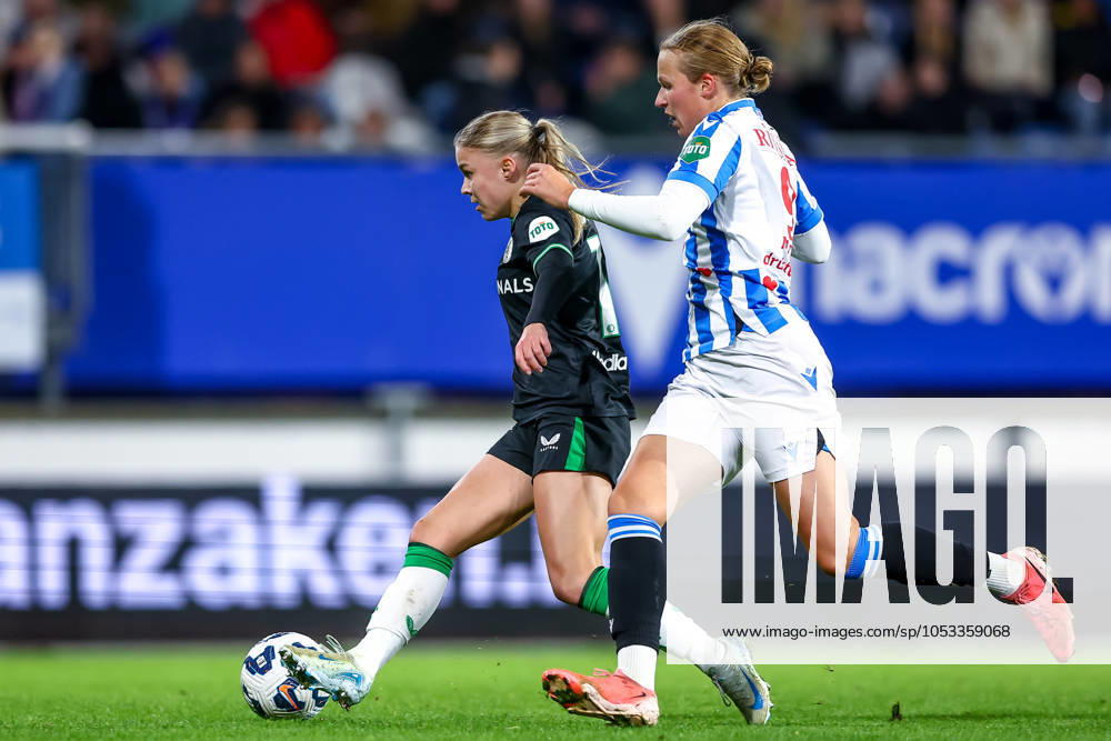 2024-11-02 sc Heerenveen v Feyenoord - Dutch Azerion Womens Eredivisie HEERENVEEN, NETHERLANDS - NOVEMBER 2: Noëlle Van Der Sluijs of Feyenoord battles for the ball with Evi Maatman of sc Heerenveen during the Dutch Azerion Womens Eredivisie match between sc Heerenveen and Feyenoord at Abe Lenstra Stadion on November 2, 2024 in Heerenveen, Netherlands. (Photo by Pieter van der Woude BSR Agency) Heerenveen Netherlands Content not available for redistribution in The Netherlands directly or indirectly through any third parties.