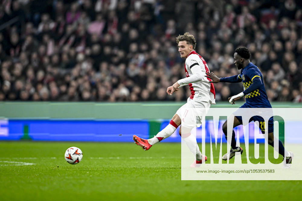 AFC Ajax Amsterdam forwarder Mika Godts, during the match Ajax Maccabi Tel Aviv at the Johan Cruijff ArenA for the UEFA Europa League League phase Matchday 4 season 2024 2025 in AMSTERDAM, Netherlands on 7 november 2024, photo by Stefan Koops EYE4images DeFodi Images not used in POL SRB CRO FRA GBR NED ITA USA Defodi 746 198879 Defodi-746 not used in POL SRB CRO FRA GBR NED ITA USA
