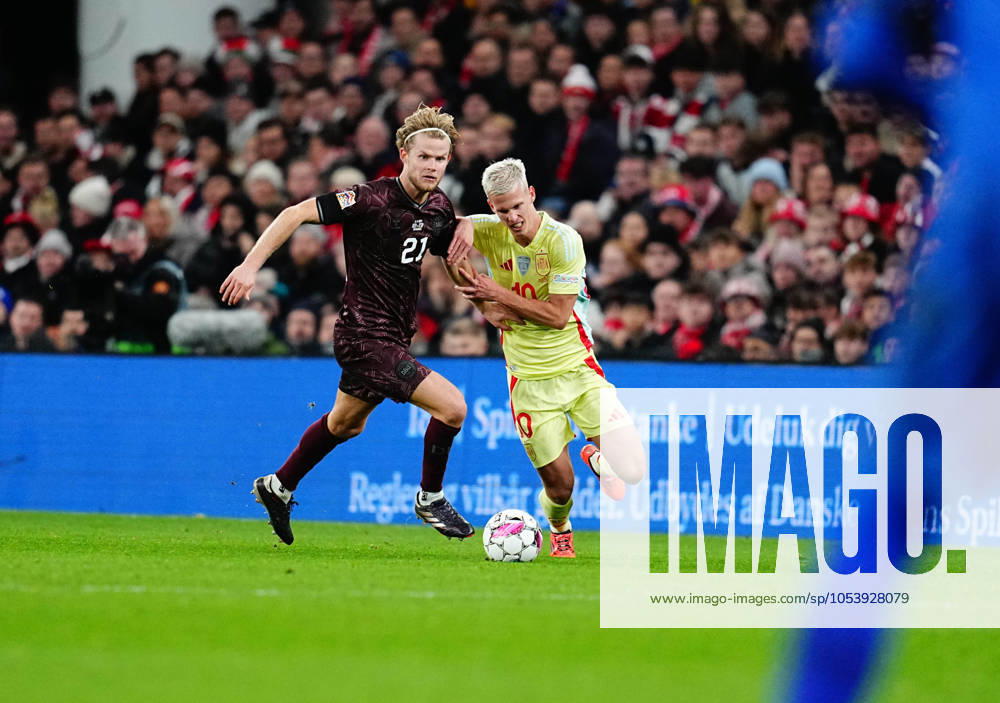 November 15 2024: Morten Hjulmand of Denmark and Dani Olmo of Spain battle for the ball during a UEFA Nations League game, Denmark vs Spain, at Parken, Copenhagen, Denmark. CSM Copenhagen Denmark - ZUMAc04_ 20241115_zma_c04_059