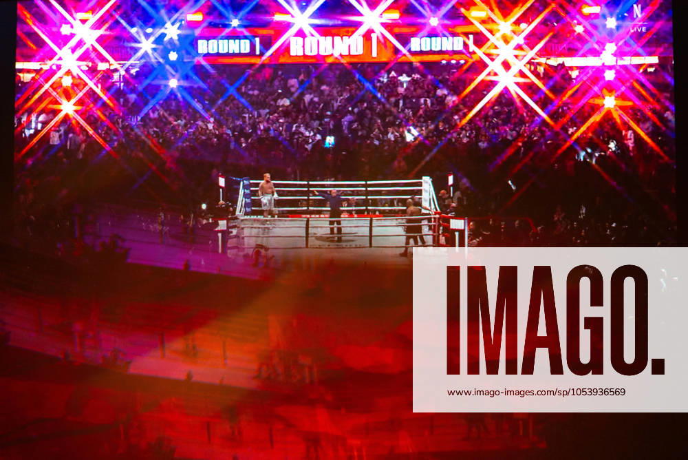 Reflections of the Paul, Tyson fight as viewed online presented by Netflix. Jake Paul wins the fight against Mike Tyson by unanimous decision after a full eight-round heavyweight match in AT&T Stadium in front of 70,000 fans on Friday. Hosted onine by Netflix with an estimated tens of millions of viewers. Manhattan USA - ZUMAt152 20241116_znp_t152_012