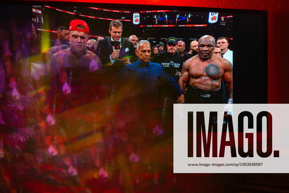 Reflections of the Paul, Tyson fight as viewed online presented by Netflix. Jake Paul wins the fight against Mike Tyson by unanimous decision after a full eight-round heavyweight match in AT&T Stadium in front of 70,000 fans on Friday. Hosted onine by Netflix with an estimated tens of millions of viewers. Manhattan USA - ZUMAt152 20241116_znp_t152_023