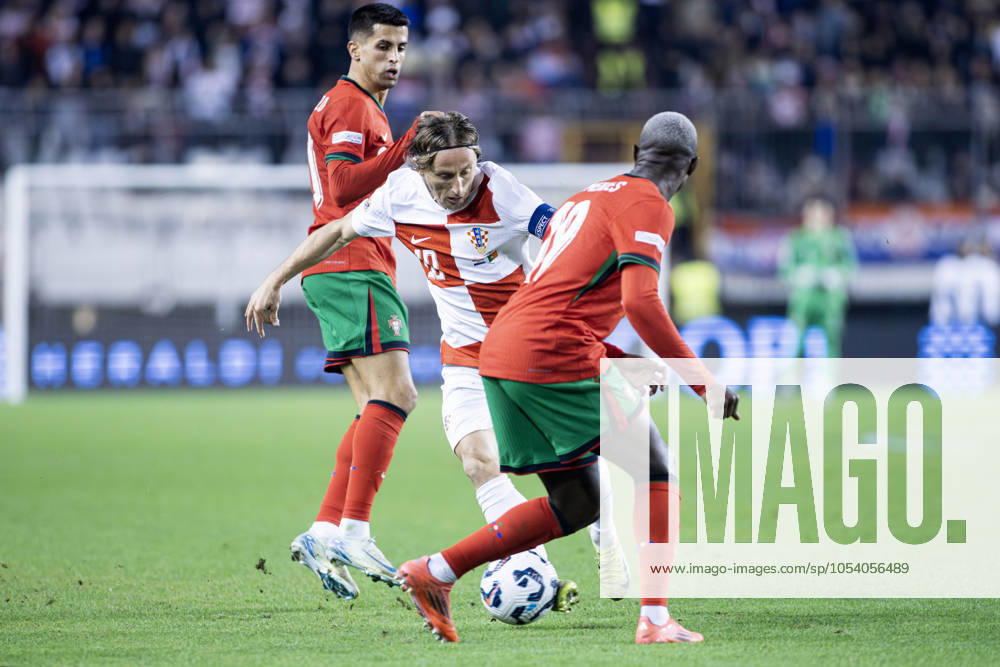 Nations League - League A, Group A1 - Croatia vs Portugal 1:1. - On photo Portuguese Joao Cancelo 20 and Nuno Mendes 19 and Croatian Luka Modric 10. Split Croatia - ZUMALEAG 20241118_mda_p210_392
