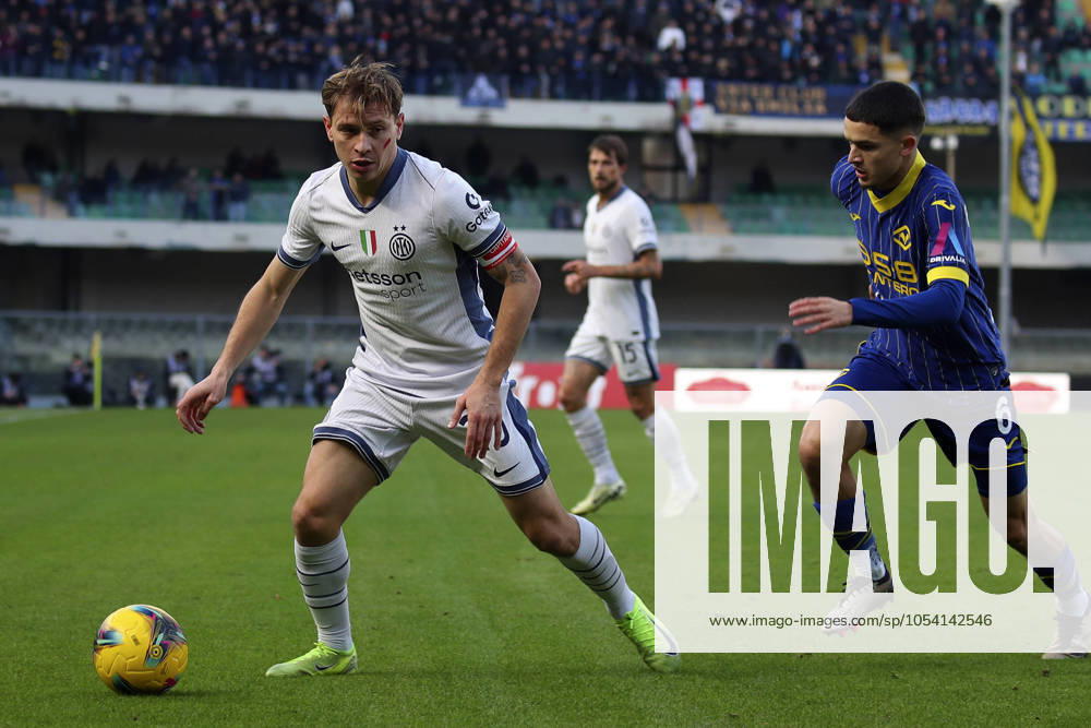 Inter Milan s Nicolo Barella Verona s Reda Belahyane during the Serie A soccer match between Hellas Verona and Inter at the Marcantonio Bentegodi Stadium, north Est Italy - Saturday, November 23, 2024. - Soccer