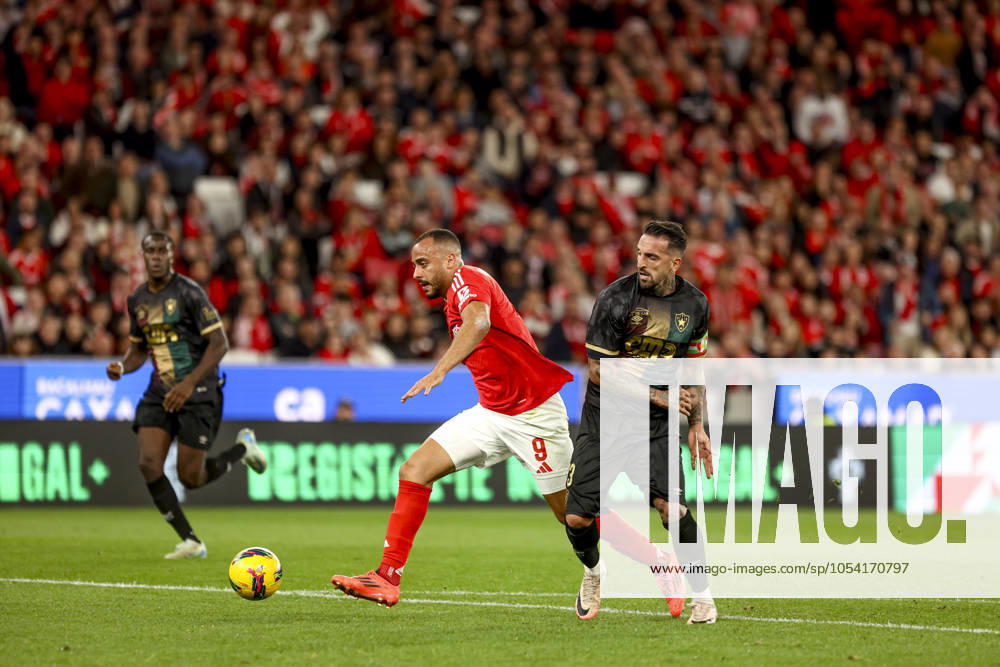 Arthur Cabral forward of SL Benfica battle for the ball with Miguel Lopes defender of Estrela Amadora during the Taca de Portugal match between SL Benfica and Estrela da Amadora CF at Estadio da Luz on 23nd November 2024, in Lisbon, Portugal. Taca de Portugal - SL Benfica vs Estrela da Amadora SAD (Valter Gouveia SPP)