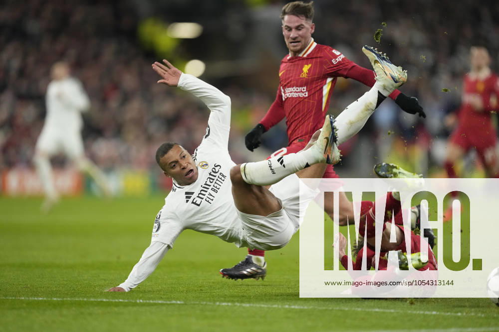 KW48 Liverpool FC v Real Madrid C.F. - UEFA Champions League 2024 25 League Phase MD5 Kylian Mbappe centre-forward of Real Madrid and France and Conor Bradley right-back of Liverpool and Northern Ireland compete for the ball during the UEFA Champions League 2024 25 League Phase MD5 match between Liverpool FC and Real Madrid C.F. at Anfield on November 27, 2024 in Liverpool, England. Liverpool England United Kingdom