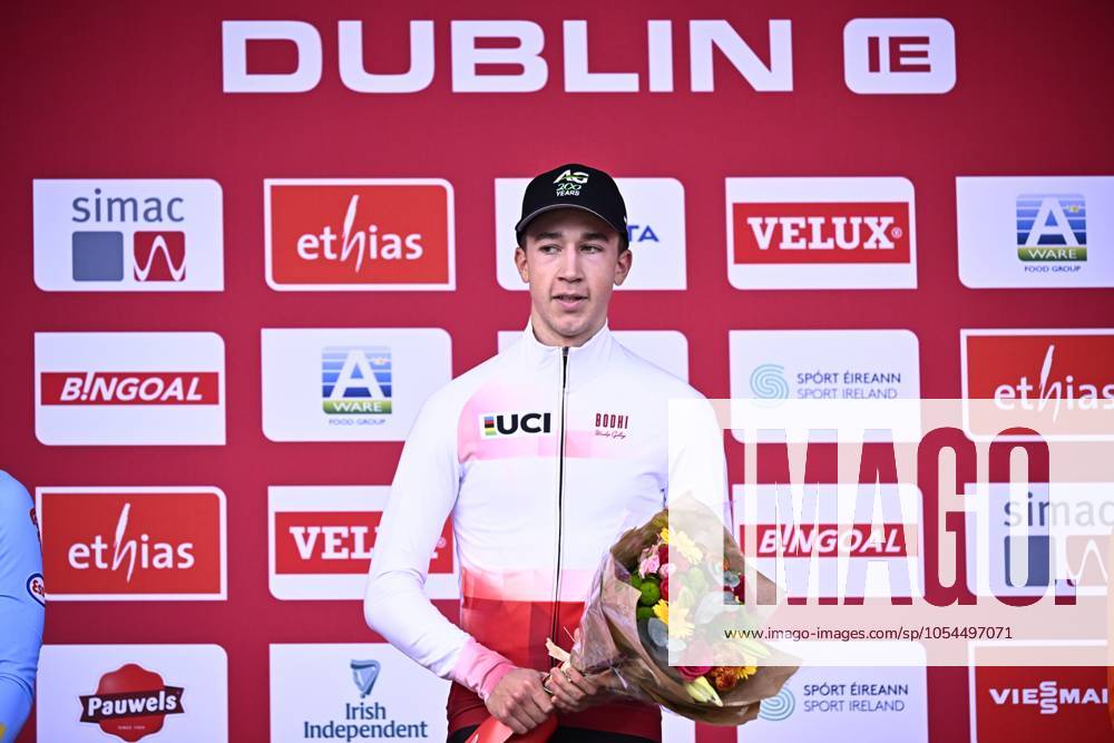 Belgian Jente Michels celebrates on the podium after winning the men s U23 race of the World Cup cyclocross cycling event in Dublin, Ireland, stage 2 (out of 12) of the UCI World Cup cyclocross competition, Sunday 01 December 2024. JASPERxJACOBS x106940798x