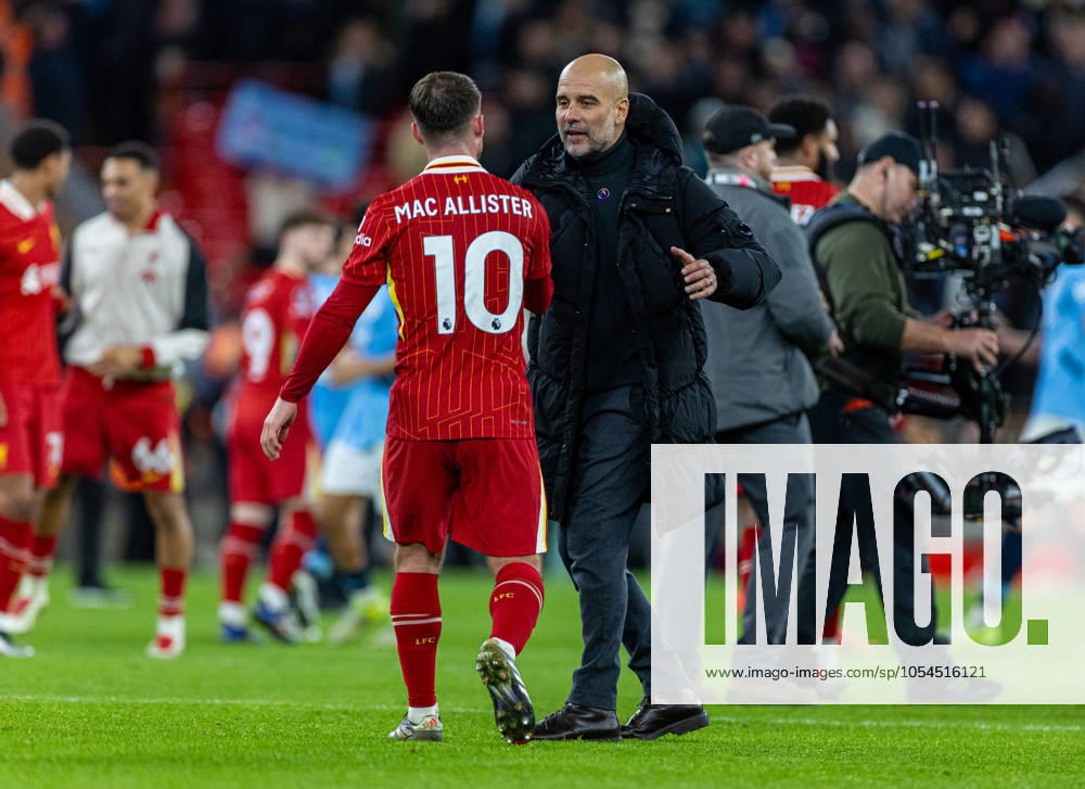 Football - FA Premier League - Liverpool FC v Manchester City FC LIVERPOOL, ENGLAND - Sunday, December 1, 2024: Manchester City s manager Josep Pep Guardiola (R) shakes hands with Liverpool s Alexis Mac Allister after the FA Premier League match between Liverpool FC and Manchester City FC at Anfield. Liverpool won 2-0. (Photo by David Rawcliffe Propaganda) LIVERPOOL Anfield MERSEYSIDE ENGLAND