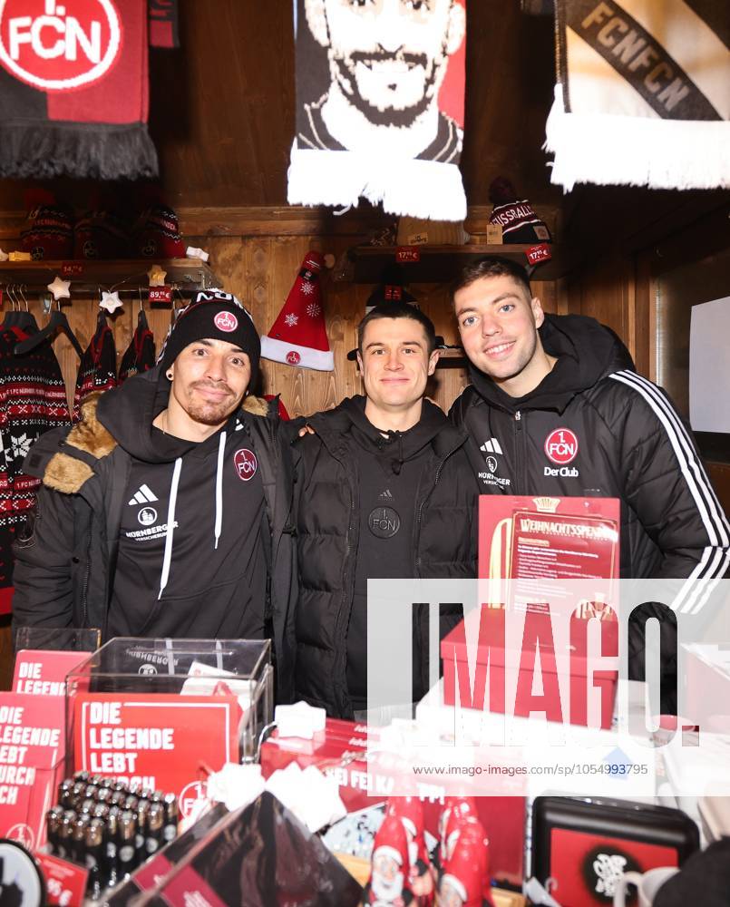 Soccer 2 Soccer Bundesliga Season 2024 2025 1 FC Nürnberg Nuernberg FCN Club Visit Barbecue at the Christkindlesmarkt Christmas Market Sportfoto Zink DaMa Danilo Soares 3, 1 FC Nürnberg FCN Oliver Villadsen 2, 1 FC Nürnberg FCN Stefanos Tzimas 9, 1 FC Nürnberg FCN in the FCNs Christmas stall