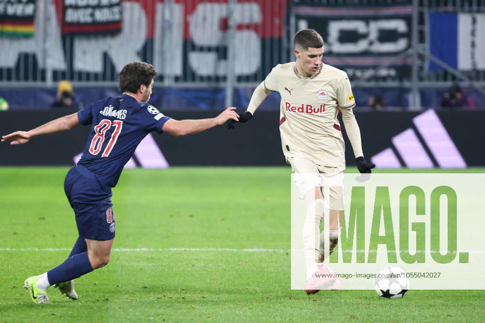 SOCCER - UEFA CL, RBS vs PSG SALZBURG,AUSTRIA,10.DEC.24 - SOCCER - UEFA Champions League, Red Bull Salzburg vs Paris Saint German. Image shows Joao Neves (PSG) and Petar Ratkov (RBS). GEPAxpictures Geieregger