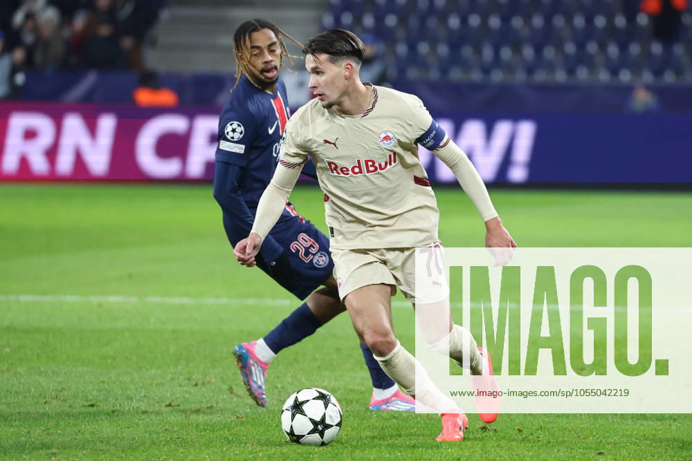 SOCCER - UEFA CL, RBS vs PSG SALZBURG,AUSTRIA,10.DEC.24 - SOCCER - UEFA Champions League, Red Bull Salzburg vs Paris Saint German. Image shows Bradley Barcola (PSG) and Amar Dedic (RBS). GEPAxpictures Geieregger