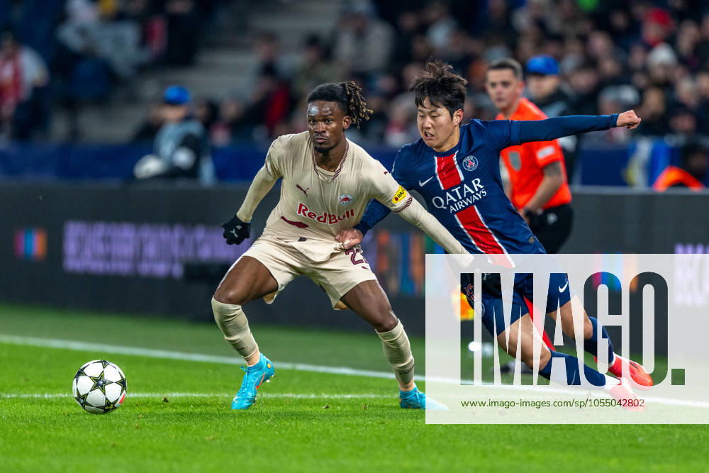 SOCCER - UEFA CL, RBS vs PSG SALZBURG,AUSTRIA,10.DEC.24 - SOCCER - UEFA Champions League, Red Bull Salzburg vs Paris Saint German. Image shows Daouda Guindo (RBS) and Lee Kang-In (PSG). GEPAxpictures xWolfgangxKofler