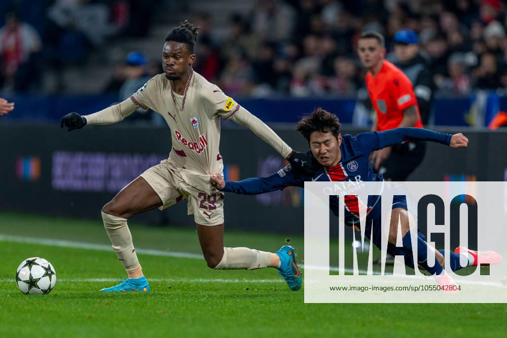 SOCCER - UEFA CL, RBS vs PSG SALZBURG,AUSTRIA,10.DEC.24 - SOCCER - UEFA Champions League, Red Bull Salzburg vs Paris Saint German. Image shows Daouda Guindo (RBS) and Lee Kang-In (PSG). GEPAxpictures xWolfgangxKofler