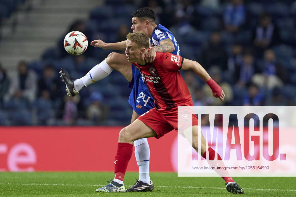 FC Porto v FC Midtjylland - UEFA Europa League 2024 25 League Phase MD6 Nehuen Perez of FC Porto competes for the ball with Adam Buksa of FC Midtjylland during the UEFA Europa League match between FC Porto and FC Midtjylland at Estadio Do Dragao in Porto, Portugal, on December 12, 2024. Porto, Portugal Porto Portugal