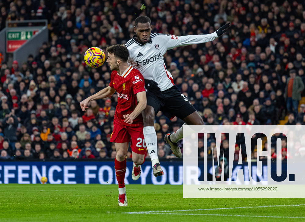 Football - FA Premier League - Liverpool FC v Fulham FC LIVERPOOL, ENGLAND - Saturday, December 14, 2024: Liverpool s Diogo Jota is fouled by Fulham s Issa Diop during the FA Premier League match between Liverpool FC and Fulham FC at Anfield. (Photo by David Rawcliffe Propaganda) LIVERPOOL Anfield MERSEYSIDE ENGLAND