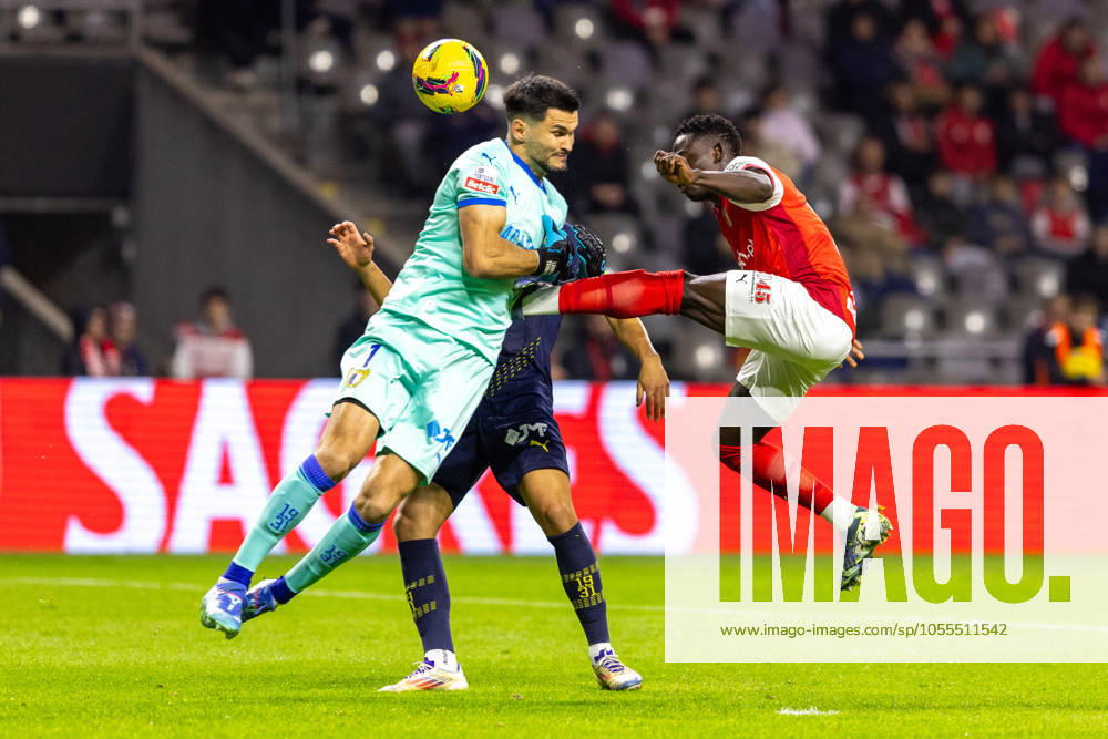 ROGER from SC Braga seen doing a dangers tackle on IVAN ZLOBIN from FC Famalicao during the Liga Portugal Betclic 2024 25 match between SC Braga and FC Famalicao at Estadio Municipal de Braga 16, 2024 in Braga, Portugal. Final Score SC Braga 3 - 3 FC Famalicao Braga Portugal - ZUMAl192 20241216_zsp_l192_035