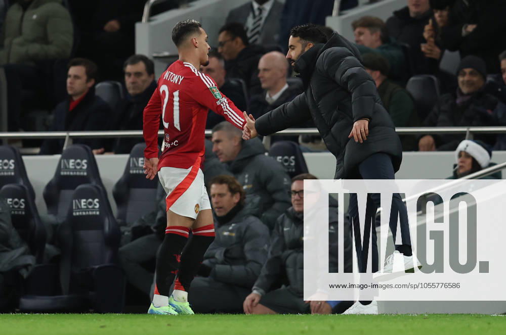 London, England, 19th December 2024. Antony of Manchester United, ManU shakes hands with Ruben Amorim, Head Coach of Manchester United after being substituted during the Carabao Cup match at the Tottenham Hotspur Stadium, London. Picture credit should read: Paul Terry Sportimage . SPI-3538-0036